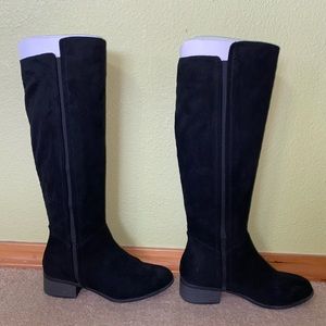 Tall black suede boots